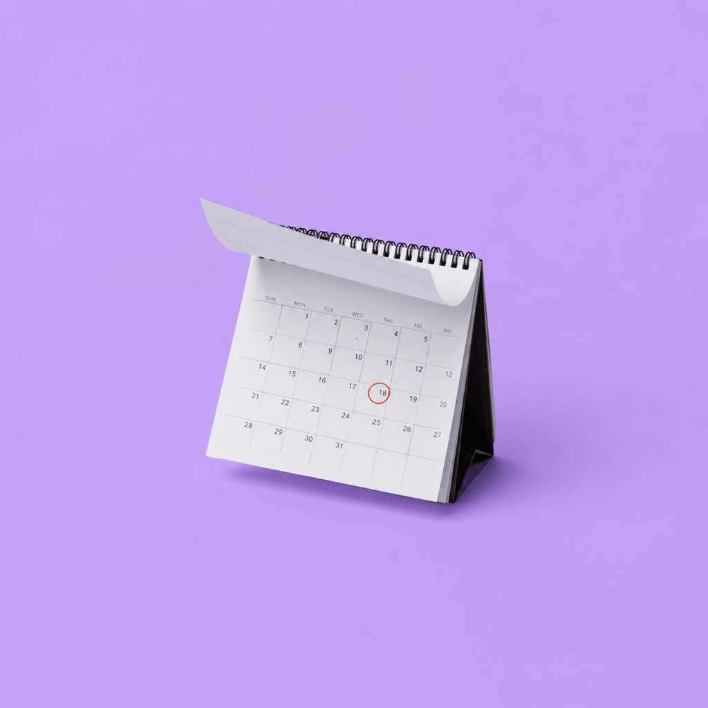 Monthly planning process guide: 60 minutes to a focused month - single desk calendar with one month page turned back, next month circled