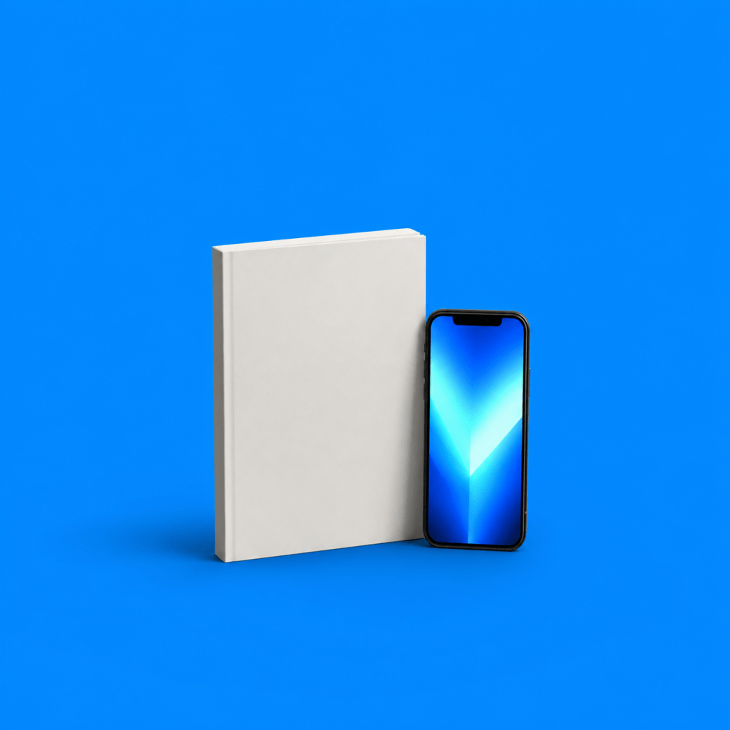 Goal Setting Workbook + Companion App: How It Works (2026) - single paperback workbook standing upright beside a glowing smartphone